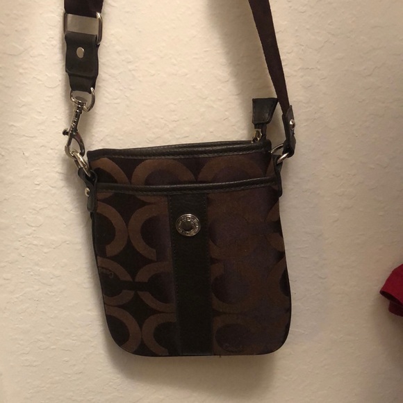 NWOT Coach crossbody bag with dust bag. Never used